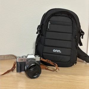 Fujifilm XT30 mirrorless camera with lens and camera bag